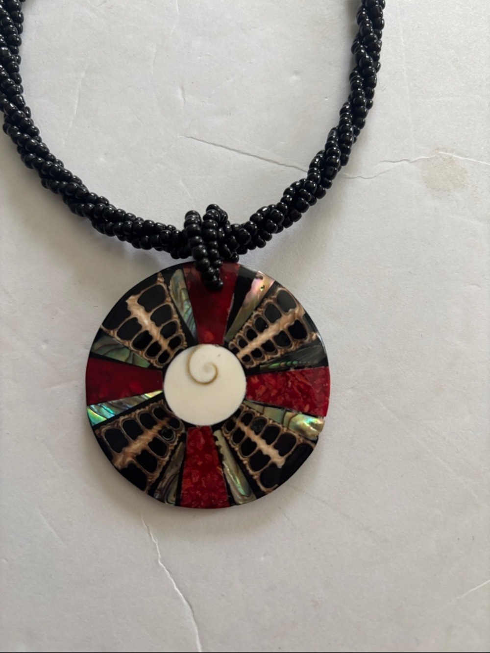 Source Unknown Black Beaded Necklace with Red, Green and Ivory Inlay Pendant